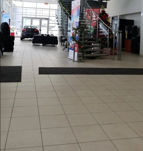 car dealearship kia longueuil floor cleaning