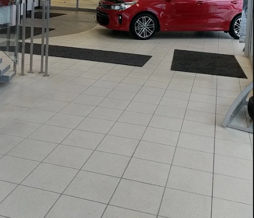 car dealership kia lonueil floor cleaning